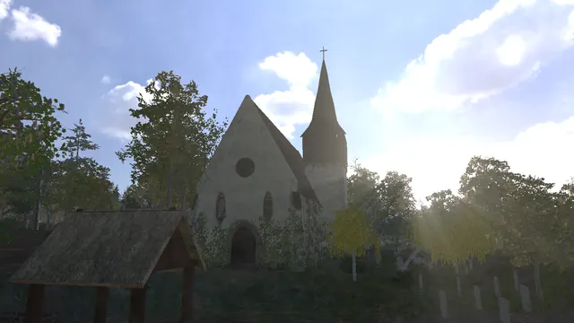 A stone church with a spire behind a thatched lych gate, in morning light.